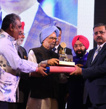 Jewel of Punjab award being given by Ex-PM India, Dr Manmohan Singh
